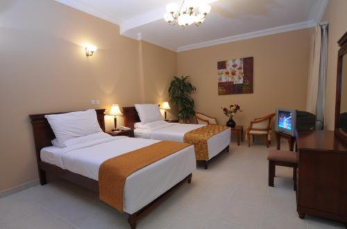 Le Grand Hotel الدوحة الغرفة الصورة